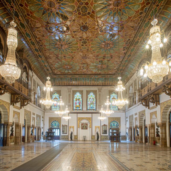 21. The Darbarhall with its chandeliers, carved wooden galleries and stained glass-min