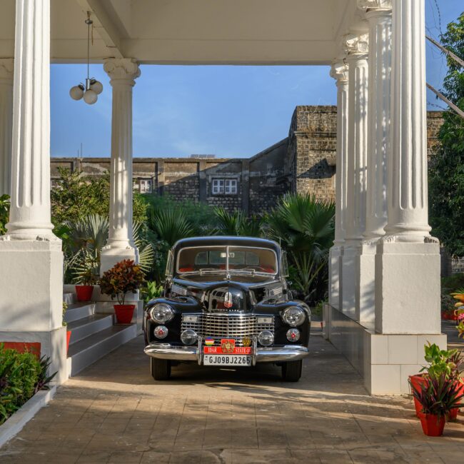 9. A fine 1941 Cadillac at the palace portico.-min